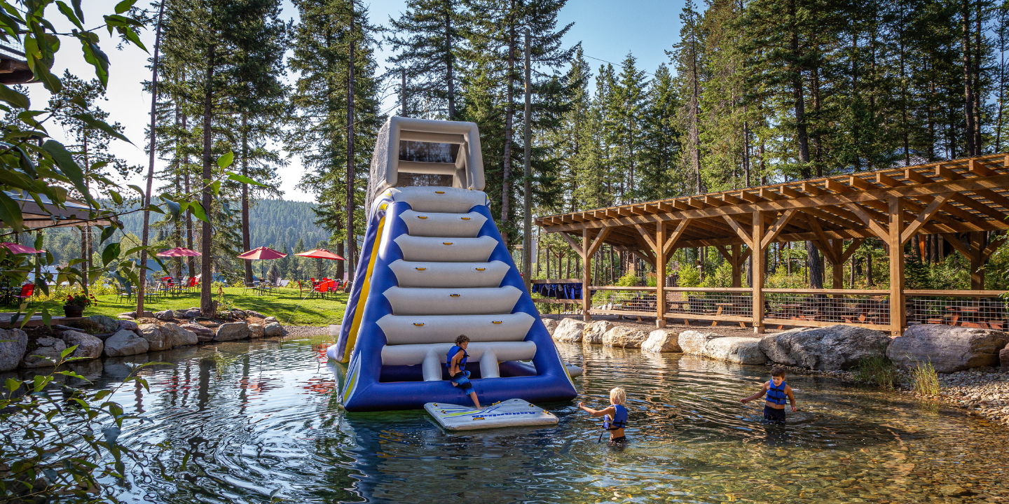 inflatable water slide at glacier higline near glacier national park